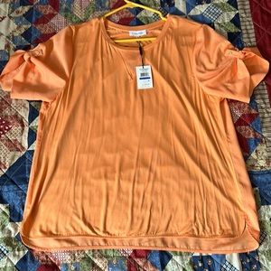 Women's size Med and Lg t-shirts, sweaters, jackets. Womens size 7 and 8 shoes